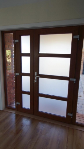 Glass paneled entry door